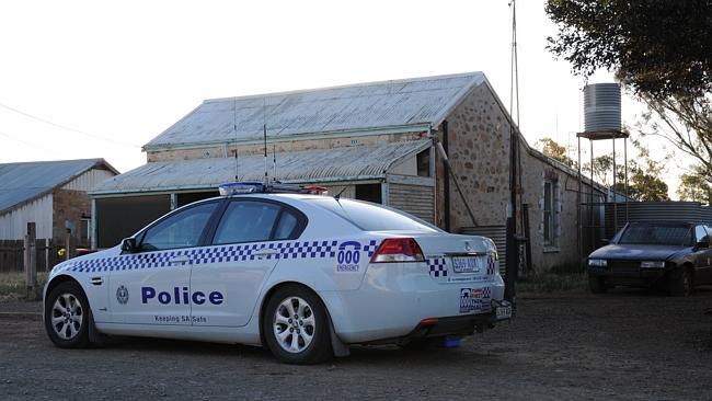 GRIM FIND: Police at Packer St, Terowie, where bones have been found. Picture: Philip Leesong