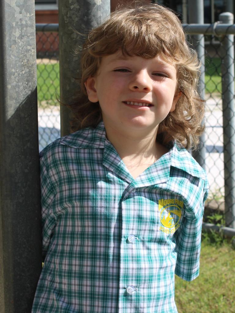 Caelan James started his first day of school at Moore Park Beach State School on Monday.