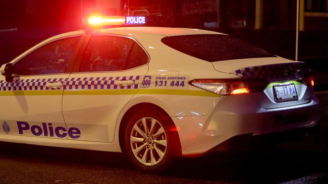 Generic Tasmania Police car. Tas Police. Tasmania Police. Logo. Police lights. Night. dark. Car Crash. Accident. Rain. Picture: PATRICK GEE