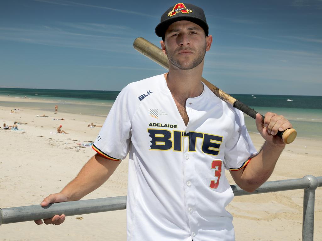 Adelaide Bite US baseball import Mikey Reynolds at Glenelg jetty. 11 December 2018. (AAP Image/Dean Martin)