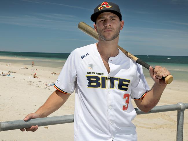 Adelaide Bite US baseball import Mikey Reynolds at Glenelg jetty. 11 December 2018. (AAP Image/Dean Martin)