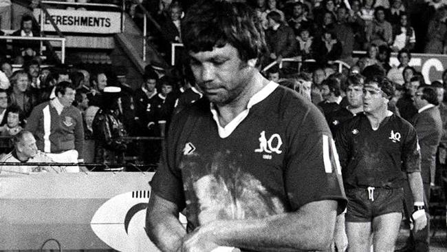 Queensland captain Arthur Beetson leads the Maroons out for the first State of Origin match. Beetson’s family are on the hunt for the jersey. Picture by Geoff McLachlan.