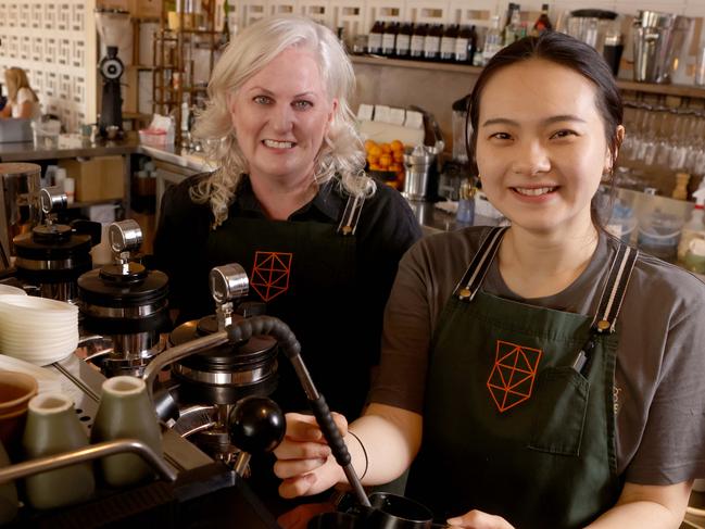 ADELAIDE, AUSTRALIA - NewsWire Photos October 3 2022: Barista Hung-Yu (Nikki) Chen with My kingdom for a Horse Cafe Owner Emily Raven. Picture: NCA NewsWire / Kelly Barnes