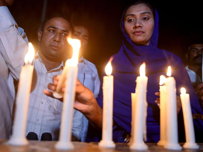 Pakistani Christians light candles to pay tribute to Sri Lankan blasts victims in Karachi on April 21, 2019. Picture: AFP