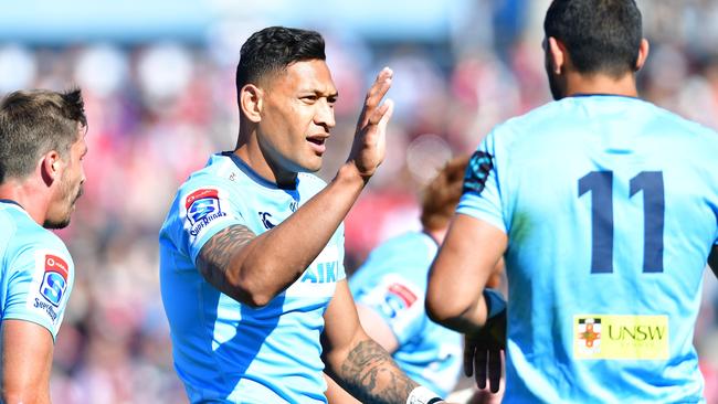 Waratahs fullback Israel Folau celebrates scoring against the Sunwolves on Saturday. Picture: Getty Images