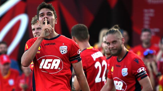 Adelaide United striker George Blackwood celebrates his late winner for the Reds against Central Coast Mariners. Picture: Daniel Kalisz/Getty Images