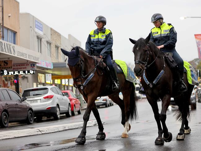 Mounted Police patrolling during lockdowns on the streets in the Fairfield City centre. Picture: NCA NewsWire / Damian Shaw