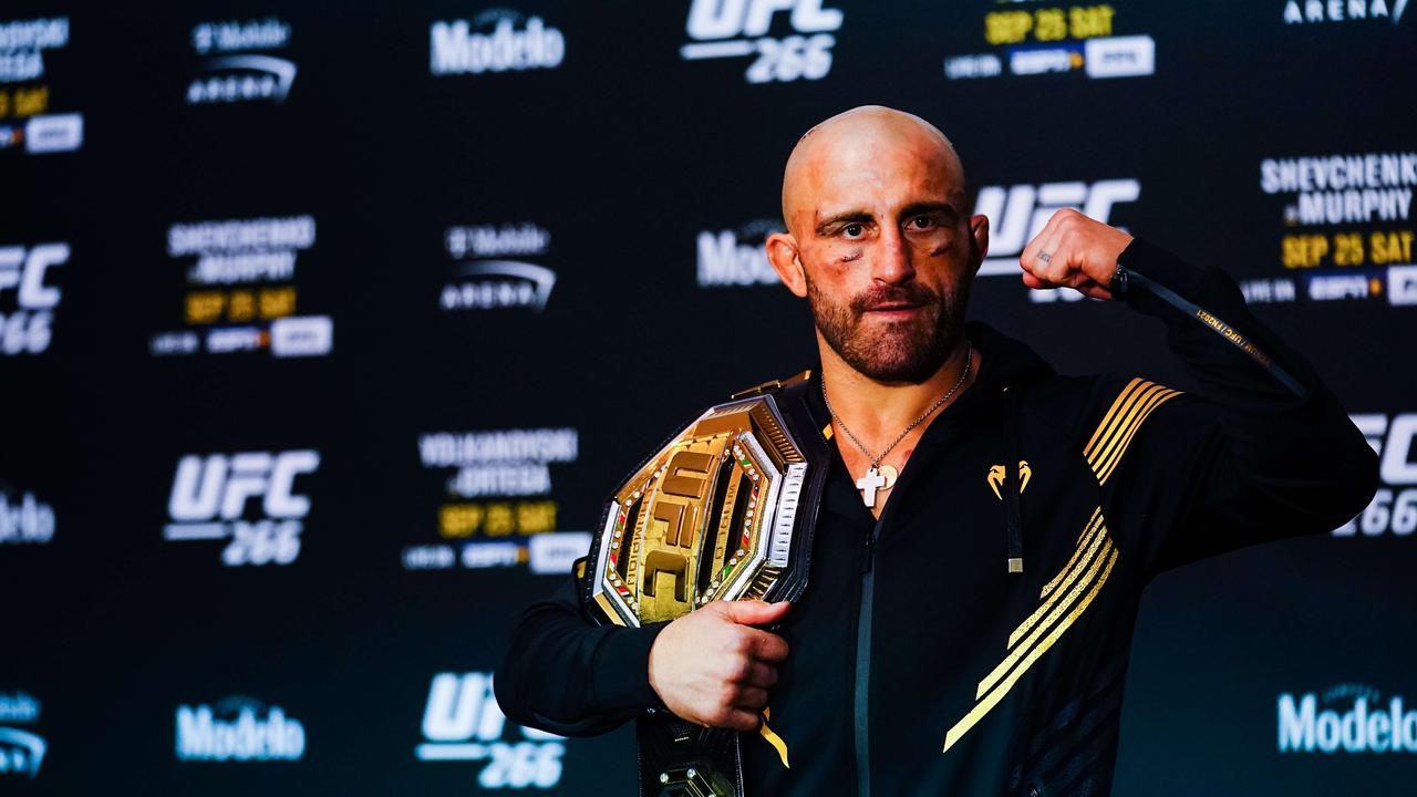 LAS VEGAS, NV - SEPTEMBER 25: Alexander Volkanovski of Australia celebrates during his post fight press conference after his win against Brian Ortega in their Featherweight title fight during UFC 266 at T-Mobile Arena on September 25, 2021 in Las Vegas, Nevada. Alex Bierens de Haan/Getty Images/AFP == FOR NEWSPAPERS, INTERNET, TELCOS &amp; TELEVISION USE ONLY ==