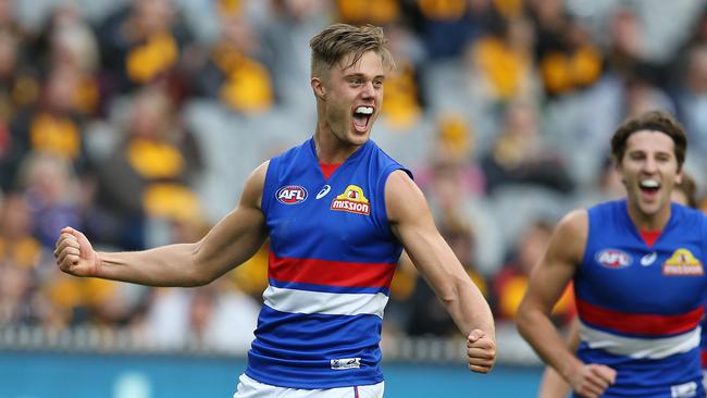 Josh Schache celebrates his goal after he was paid a free kick late in the fourth quarter. Picture: Michael Klein