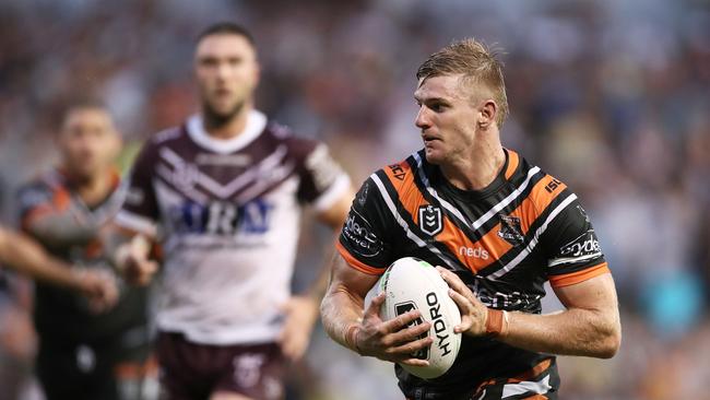 Luke Garner lost his mouthguard while celebrating his first NRL try. (Photo by Matt King/Getty Images)