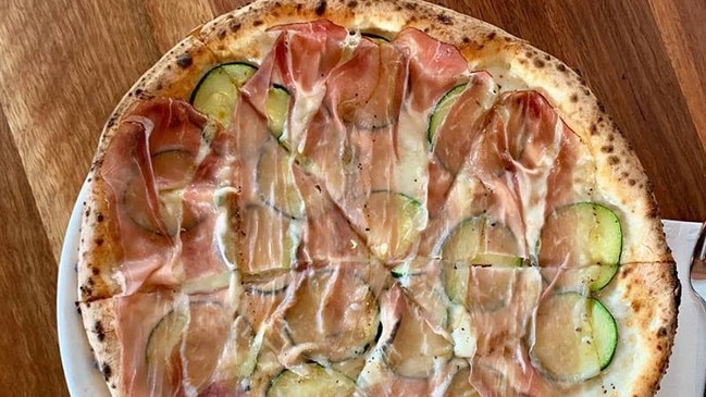 Head to Julius for the mozzarella, zucchini, taleggio and smoked prosciutto pizza. Picture: Facebook/@juliuspizzeria