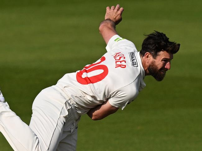 HOVE, ENGLAND - MAY 18:  Michael Neser of Glamorgan bowls as fellow Australian Steve Smith of Sussex looks on during the LV= Insurance County Championship Division 2 match between Sussex and Glamorgan at The 1st Central County Ground on May 18, 2023 in Hove, England. (Photo by Mike Hewitt/Getty Images)