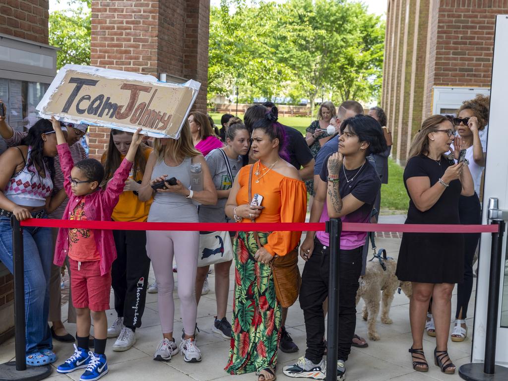 Fans gather outside the Fairfax County Circuit Courthouse. Picture: Getty