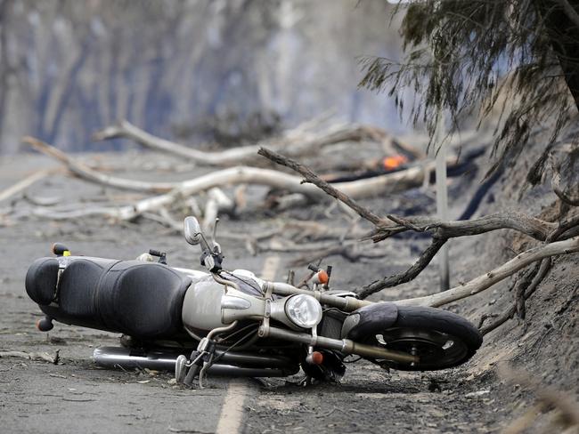 : A motorcycle abandoned on the Heidelberg-Kinglake Road. 