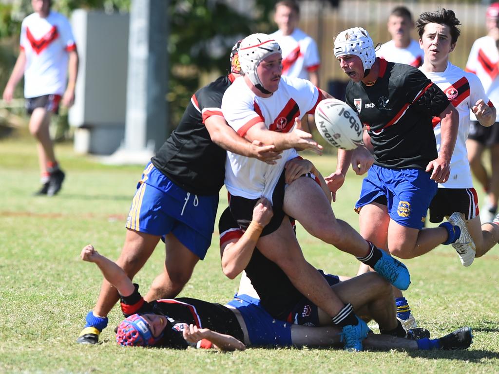 Boys Rugby League State Championship held at Northern Division, Brothers Leagues ground, Townsville. South West (black) v Wide Bay (white). 16-18 years. Blaine Watson of Gympie SHS.