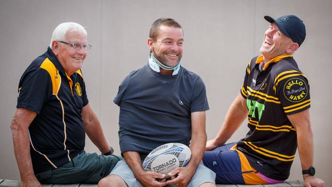 Damian Bruce (centre) with former Brighton Rugby Club coach Barry Cooper and old teammate Richard Wasley. Damian is unable to work for six months after breaking his neck jumping in the family pool.