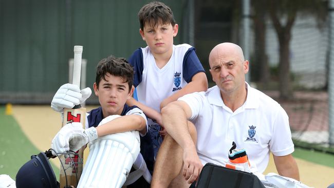 Sturt District cricket coach John Ranaldo with his sons Lachlan, 13, and Ben, 9, are hopeful the competition will resume soon. Picture: Dean Martin