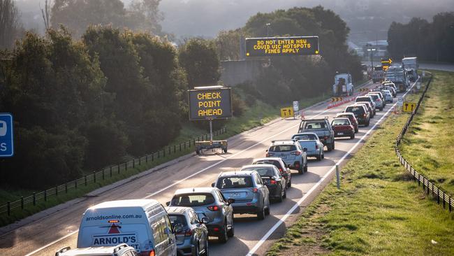 Queues of cars stretch into Albury from the Victorian side of the border. Picture: Simon Dallinger