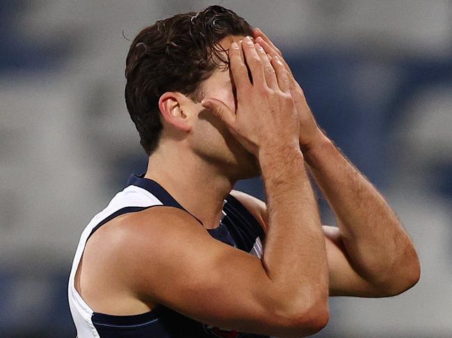 GEELONG, AUSTRALIA - AUGUST 21, 2021:    Luke Dahlhaus of the Cats reacts after missing a last qtr shot at goal  during the round 23 AFL match between  Geelong and Melbourne at the GMHBA Stadium, on August 20, 2021, in Geelong, Australia. (Photo by Michael Klein)