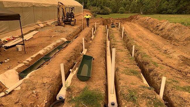 A pipe bioreactor partially installed on a farm in the Coffs Harbour region. Picture: Shane White / Southern Cross University