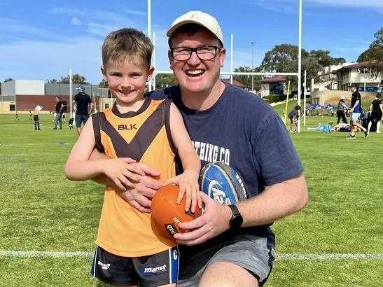 Former Hawthorn &amp; West Coast footballer Xavier Ellis with his son, Ted.