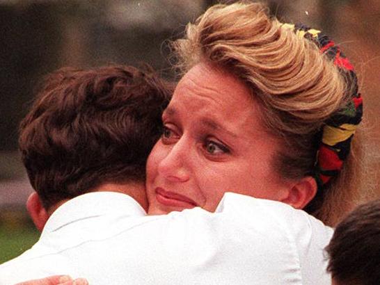 Walter Mikac, whose wife & daughters were victims of Port Arthur massacre 28/04/96addressed demonstrators at anti gun rally at Sydney's Domain 28/07/96, in promotion of proposed national gun laws, is comforted by brother Steve & Gabrielle Mejak.Mika/fam  New South Wales (NSW) / Demonstration / Gun Control