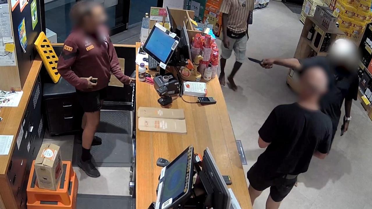 Two men pull a knife on this bottle-shop worker before making off with six-packs and cigarettes.
