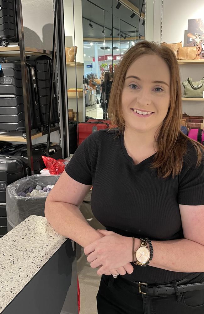 Elyce Smith, assistant manager at handbags and luggage outlet Strandbags, also regularly advises customers struggling with connectivity to move to the entrance of the store.