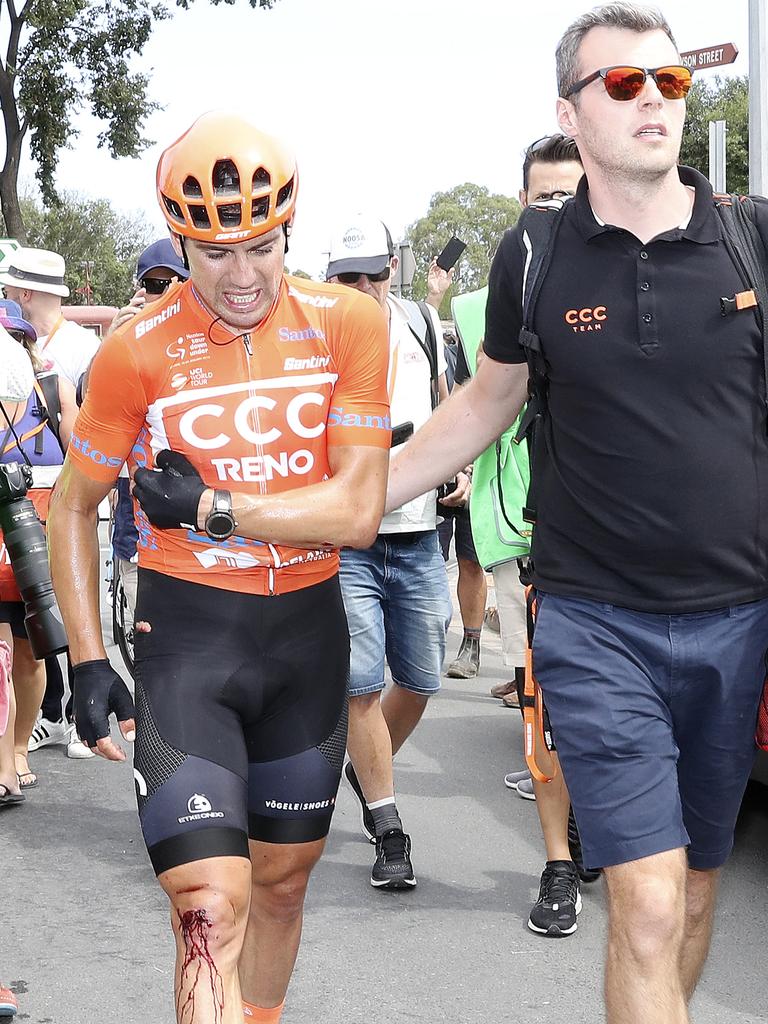 The Ochre Jersey wearer Patrick Bevin grimaces while blood streams from his leg after his crash on Stage 5 of the Tour Down Under. Picture Sarah Reed