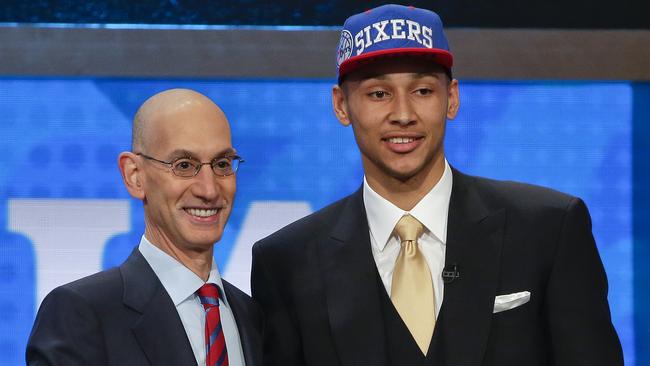 LSU's Ben Simmons poses for a photo with NBA Commissioner Adam Silver after being selected as the top pick by the Philadelphia 76ers