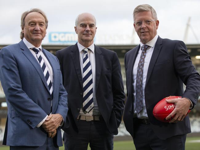 Brian Cook and Geelong president Craig Drummond with Steve Hocking. Picture: Alan Barber