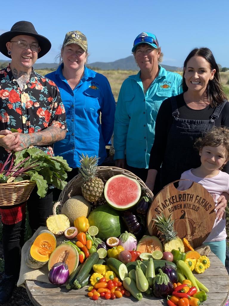 Dan, Steph and their daughter Emmy were blown away by the quality of produce on offer at places like Stackelroth Farms, where they're pictured with co-owners Michelle O'Regan and Belinda Williams. Picture: Supplied.