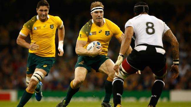 CARDIFF, WALES - SEPTEMBER 23: David Pocock of Australia in action during the 2015 Rugby World Cup Pool A match between Australia and Fiji at Millennium Stadium on September 23, 2015 in Cardiff, United Kingdom. (Photo by Stu Forster/Getty Images)