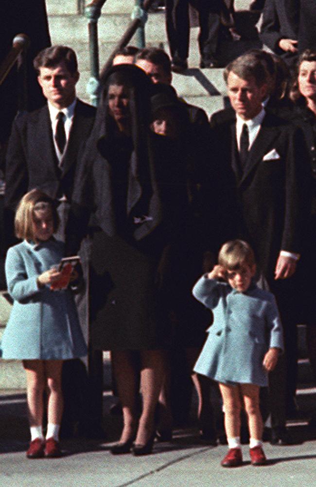 The funeral of US President John F Kennedy in Washington on 25 November, 1963. Son John Jnr salutes the casket with his mother Jackie and sister Caroline, uncles Robert and Edward by his side.