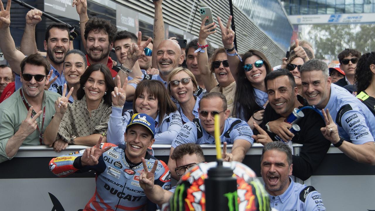 JEREZ DE LA FRONTERA, SPAIN - APRIL 28: Marc Marquez of Spain and Gresini Racing MotoGP celebrates the second place with team and family under the podium at the end of the MotoGP race during the MotoGP Of Spain - Race on April 28, 2024 in Jerez de la Frontera, Spain. (Photo by Mirco Lazzari gp/Getty Images)