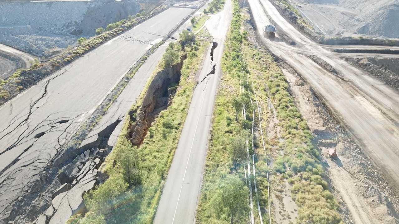 CRACKING UP: John Eden took these aerial photographs of Gibihi Rd, Moura yesterday. They were shared to The Moura & Dawson River Flooding History Page Facebook yesterday, after a blast on Saturday. Picture: John Eden