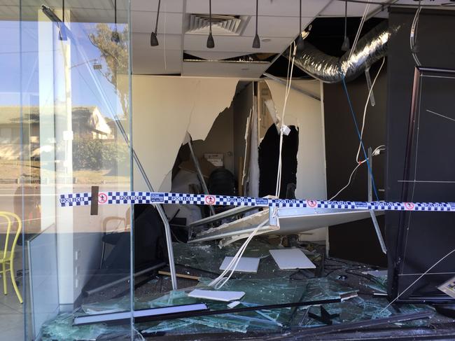 The aftermath of the Bateau Bay office after an elderly lady crashed into it. Picture: Richard Noone