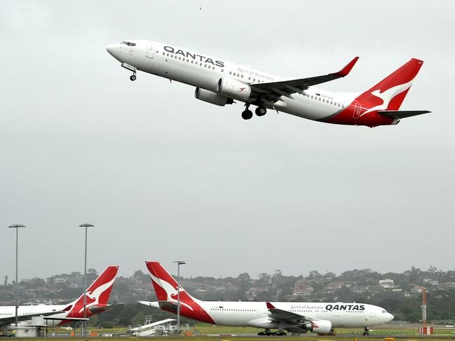 A Qantas plane taking off from the Sydney International airport . Picture: AFP.