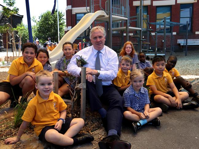 06/02/2018 Catholic Education boss Stephen Elder with students   Pietro Gottoli, Mia Phu, Tobias Hutchinson,, Lilliana Macali-Patane, Darcy Manickam, Elise Dabbs,  Sunnie Barr, Ayak Deng, Allan Truong and Chol Deng at St John's Primary School in Clifton Hill, Melbourne. Picture David Geraghty / The Australian.