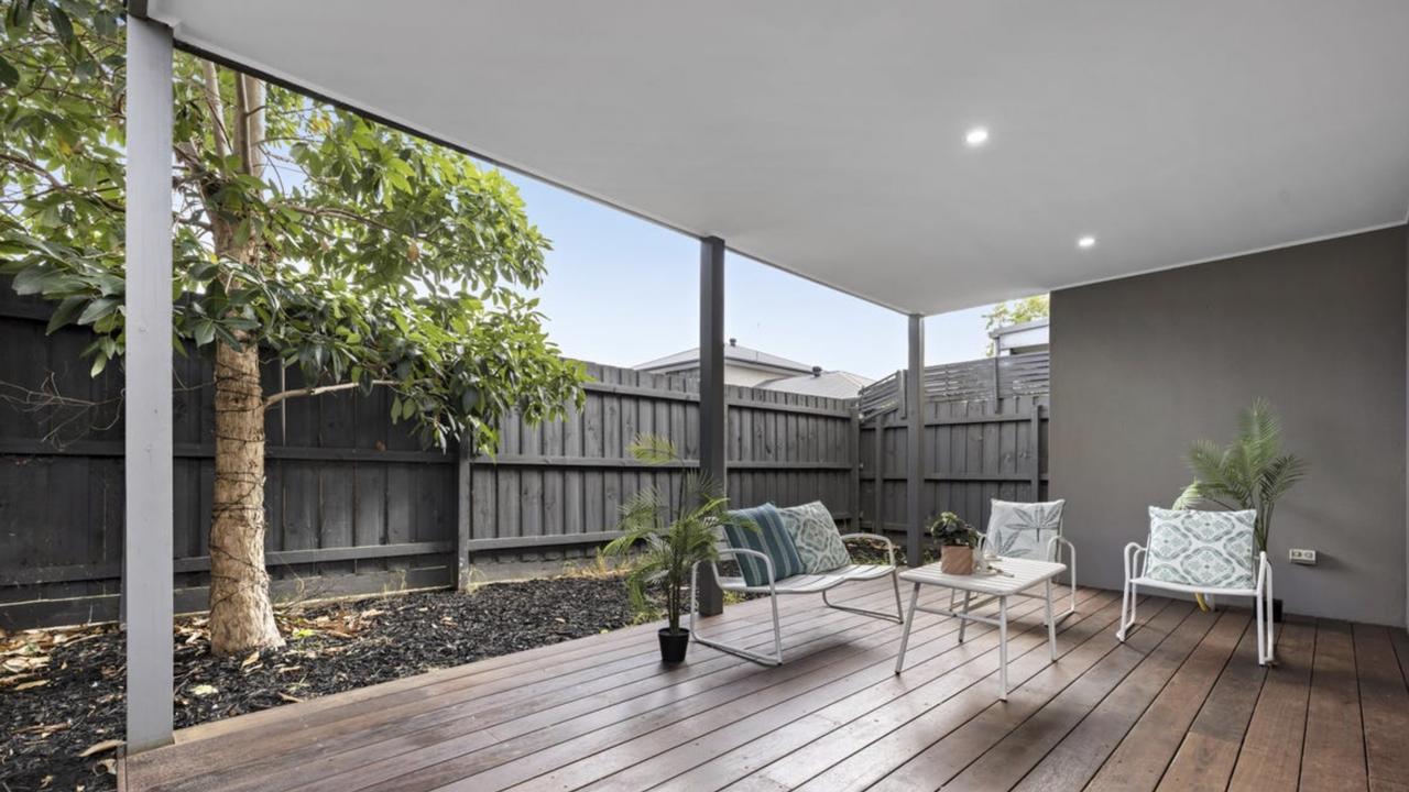 A covered timber deck offers the perfect private setting for outdoor dining or relaxing in peace.
