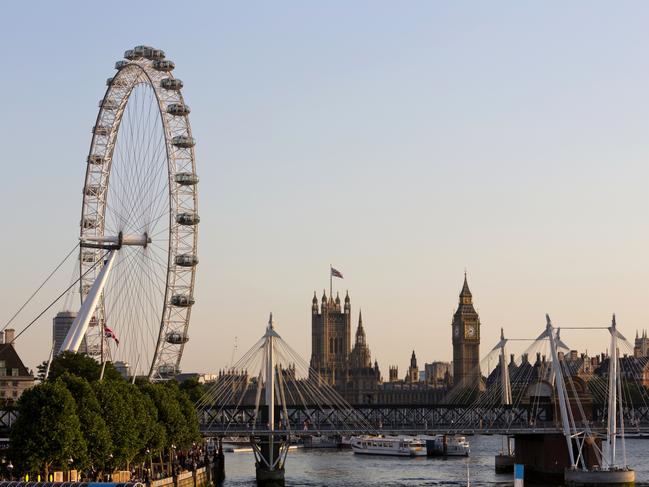 ESCAPE:  "London, UK - July 24, 2012: London - View of The Palace of Westminster over the Hungerford Bridge with the London Eye and Jubilee Gardens on the left side lit by a beautiful light just before sunset."  Picture: Istock