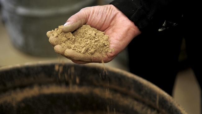 A handful of extracted rare earth elements. Picture: Jacob Kepler/Bloomberg