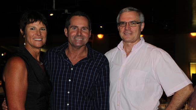 MILESTONE MOMENTS: General Manager of the Airlie Beach Hotel Mark Bell (centre) celebrated 20 years in the job with a special dinner attended by company directors Patrice Matthews-Frederick and Paul O'Neill (left and right) at Capers restaurant on Saturday night. Picture: Sharon Smallwood (13/03/2012)