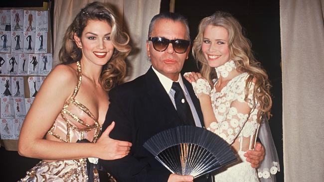 Lagerfeld with Cindy Crawford and Claudia Schiffer in 1993. Picture: Getty Images