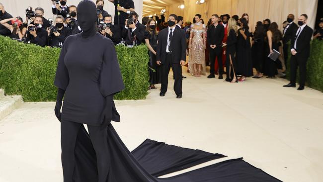 Kim Kardashian wore what we all wish we could when we wake up in the morning and see a pimple brewing on our face. Picture: Getty.