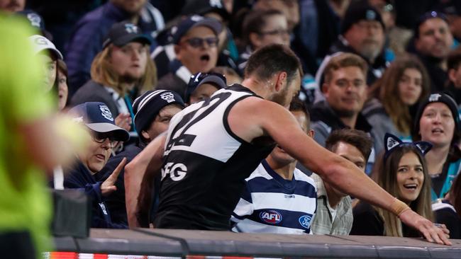 It was all good fun as Charlie Dixon shared a laugh with opposition supporters. Picture: Michael Willson/AFL Photos.