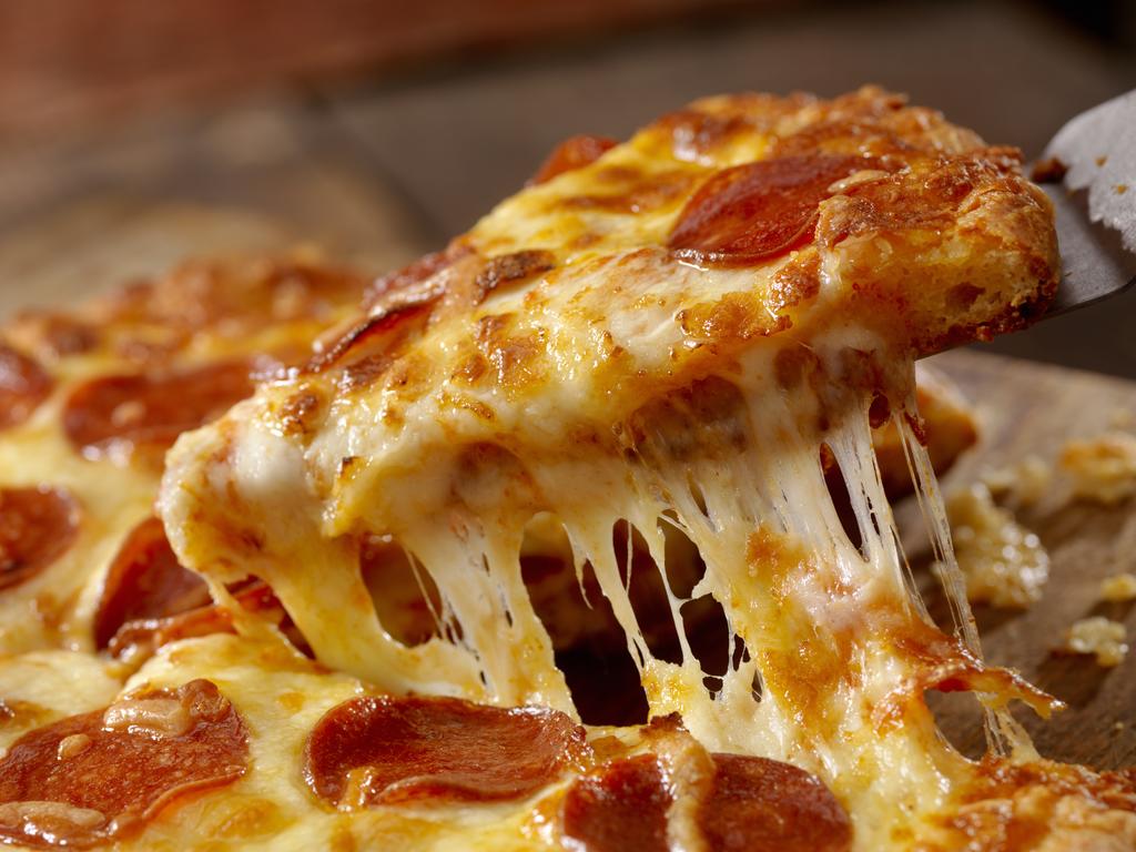 It’s hard to say no to a cheesy pizza. Picture: iStock