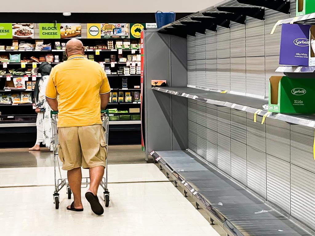 SYDNEY, AUSTRALIA - NewsWire Photos JANUARY 11, 2022: Shelves for toilet paper left empty at Granville Woolworths, Sydney, as COVID cases rise across the country. Picture: NCA NewsWire / Dylan Robinson