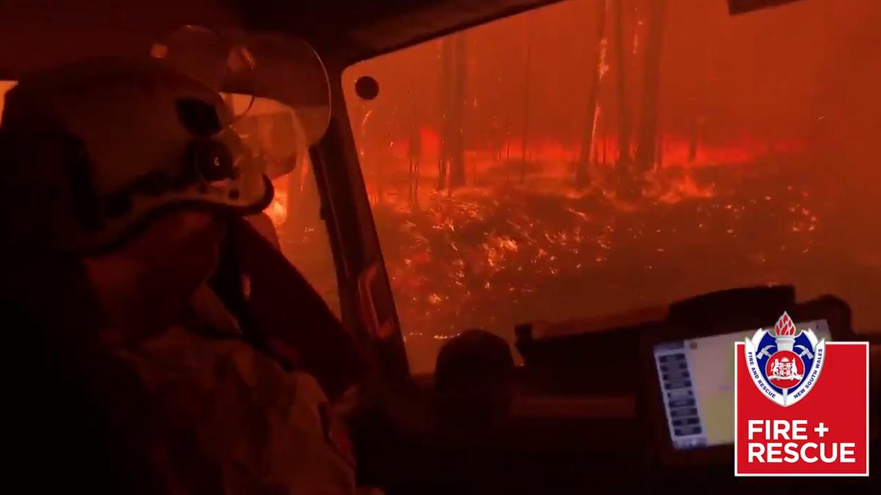 The crew from Station 509 Wyoming recorded this video showing the moment their truck was overrun by the bushfire burning South of Nowra. Picture: NSW Fire and Rescue