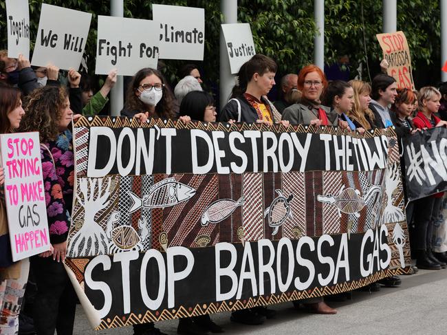 MELBOURNE, AUSTRALIA - NOVEMBER 15: Protesters gather at the front of the Federal Court of Australia on November 15, 2022 in Melbourne, Australia. The Federal Court is hearing an appeal by Santos Ltd., which seeks to restart drilling in the Barossa Gas project, located near the Tiwi Islands off the northern coast of Australia. Courts had earlier ruled the approval for drilling in the project as invalid. (Photo by Tamati Smith/Getty Images)